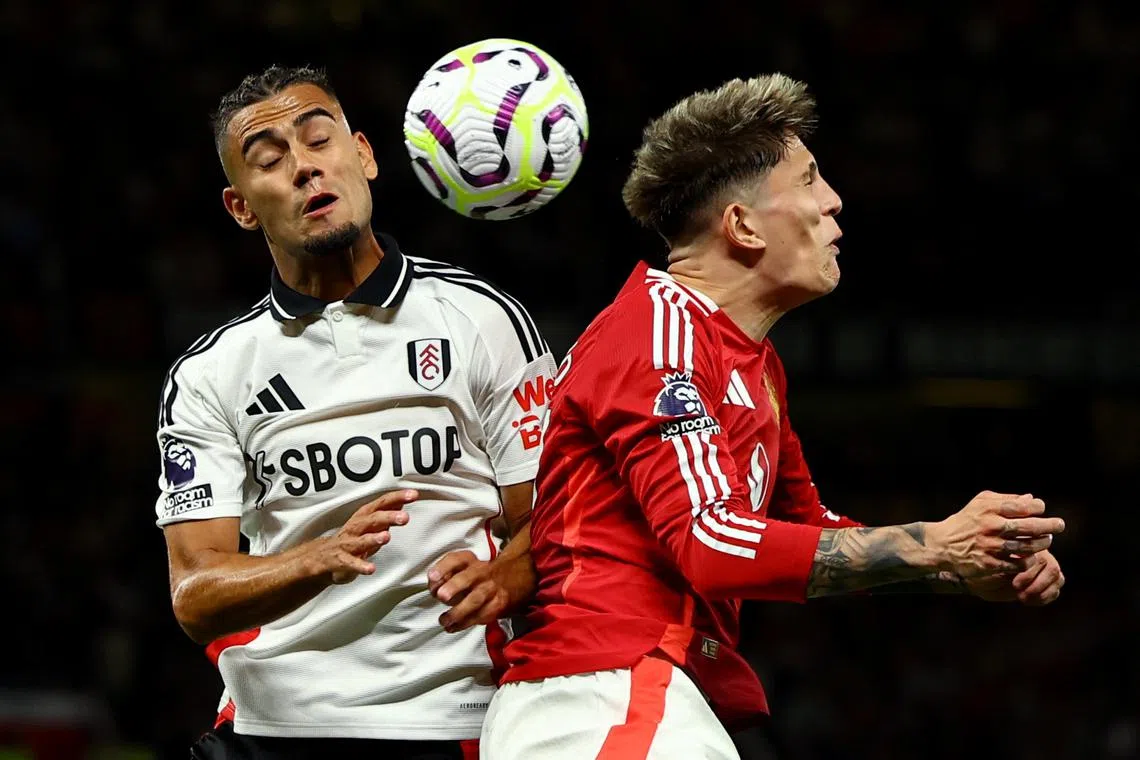 Soccer Football - Premier League - Manchester United v Fulham - Old Trafford, Manchester, Britain - August 16, 2024  Manchester United's Alejandro Garnacho in action with Fulham's Andreas Pereira REUTERS/Molly Darlington/File Photo