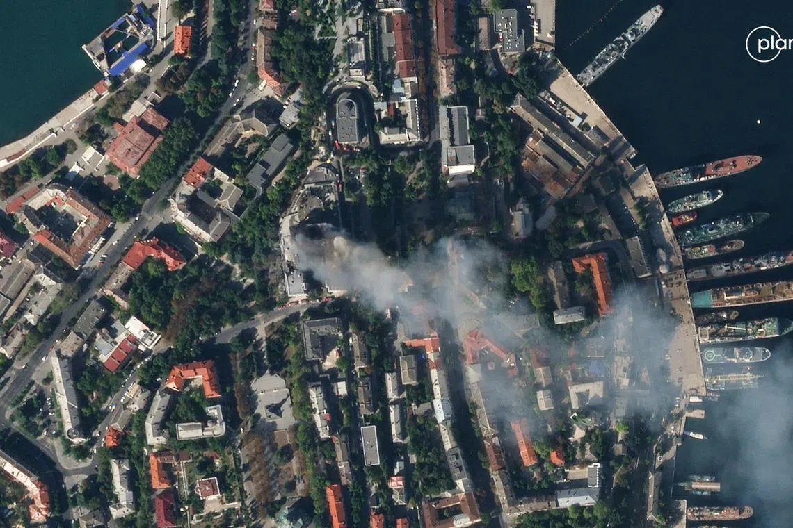 A satellite image shows smoke billowing from a Russian Black Sea Navy HQ after a missile strike, as Russia's invasion of Ukraine continues, in Sevastopol, Crimea, September 22, 2023.  PLANET LABS PBC/Handout via REUTERS    THIS IMAGE HAS BEEN SUPPLIED BY A THIRD PARTY.  NO RESALES. NO ARCHIVES. MANDATORY CREDIT. DO NOT OBSCURE LOGO