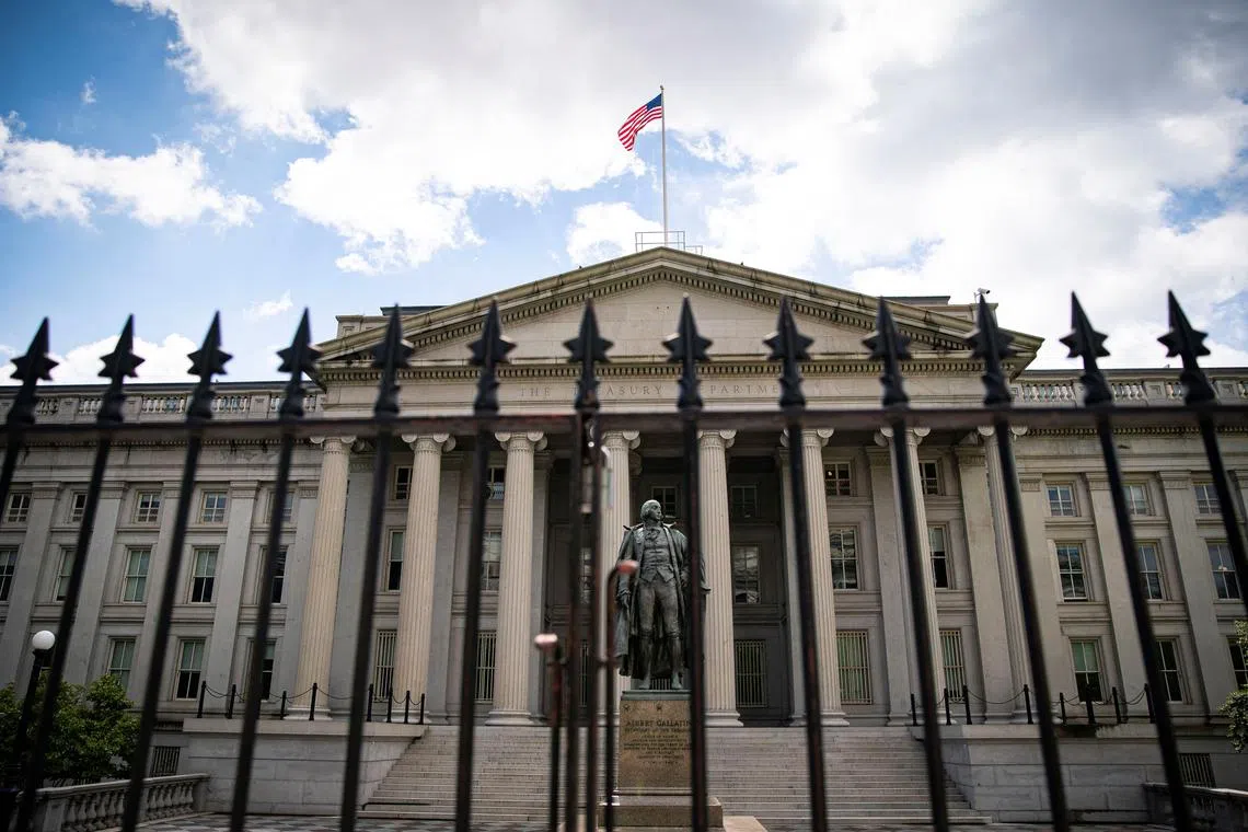 FILE PHOTO: A statue of former Sen. Albert Gallatin stands at the Treasury Department in Washington, U.S., April 25, 2021. REUTERS/Al Drago/File Photo