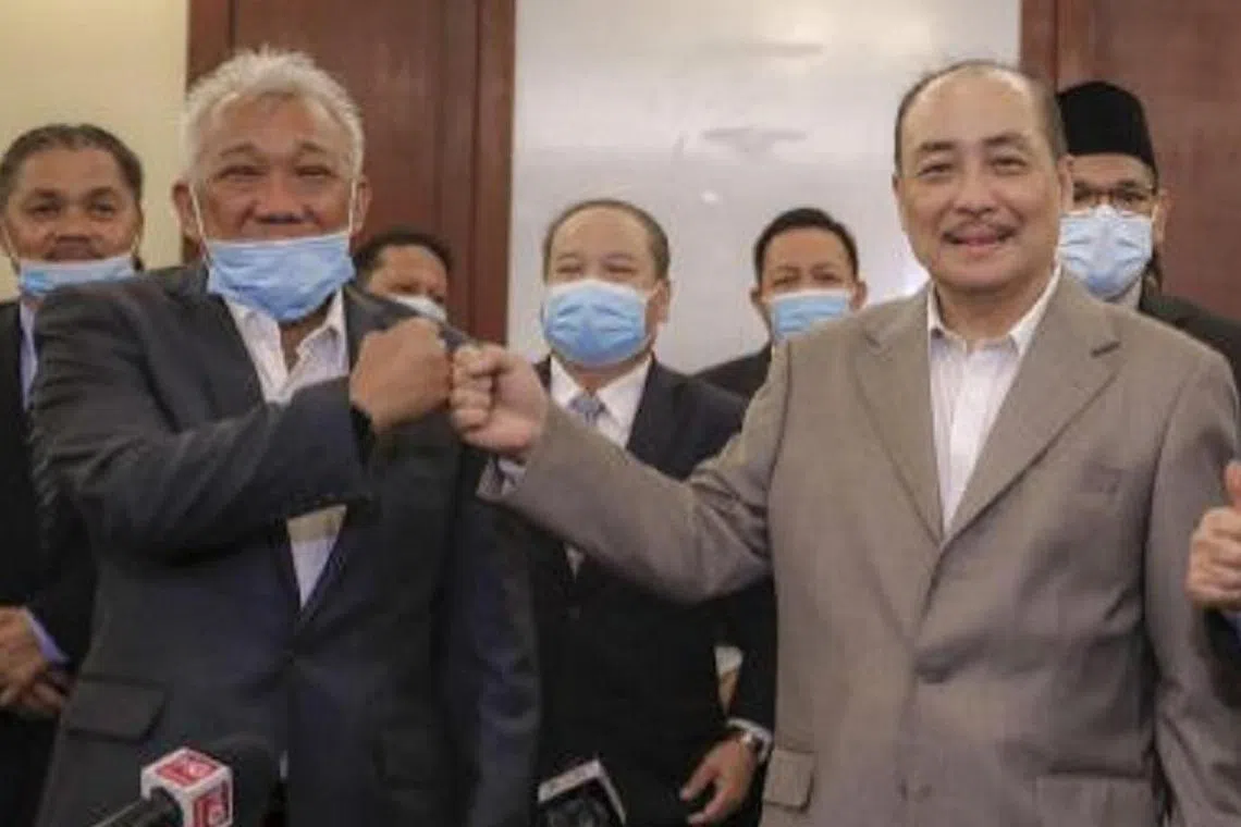 Sabah BN chief Bung Moktar (left) and Sabah Chief Minister Hajiji Noor. Sabah BN pulled out from the state government on Friday.