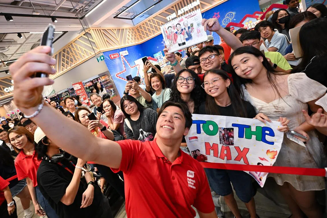 ST20240824-202479200759-Lim Yaohui-Deepanraj Ganesan-dgmax24/
Max Maeder interacting with fans during a meet and greet event at FairPrice Xtra VivoCity on Aug 24, 2024.
In celebration of Max Maeder's Olympic achievement, Yeo's and FairPrice Group will be hosting a meet and greet event on 24 August 2024 from 2 to 3pm at FairPrice Xtra VivoCity.
Max will be signing autographs and sharing his experiences with a rapid fire questions segment for audiences to get to know Max.
FairPrice Foundation will also be making a $10,000 donation towards Singapore Sailing Federation (SSF) that will go towards supporting the nutritional health of Singapore sailors.
(ST PHOTO: LIM YAOHUI)