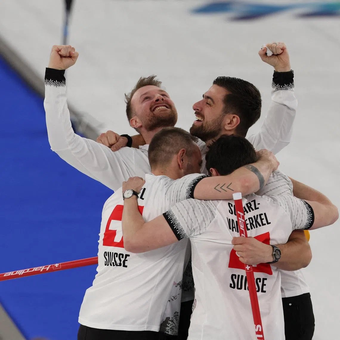 Milano Cortina 2026 Olympics - Curling - Men's Bronze Medal Game - Norway vs Switzerland - Cortina Curling Olympic Stadium, Cortina d'Ampezzo, Italy - February 20, 2026. Team Switzerland celebrates after winning the bronze medal match against Norway REUTERS/Issei Kato