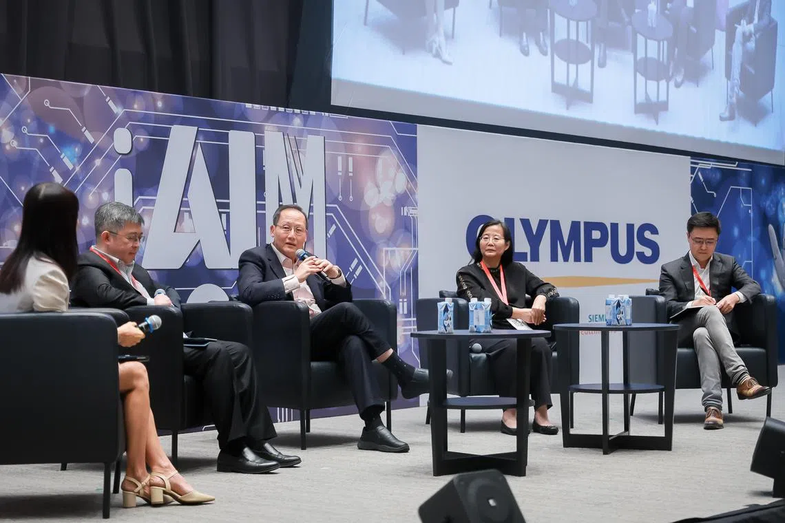From left: 
Moderator NTU Wee Kim Wee School of Communication and Information Chair Prof May Oo Lwin, Ministry of Health Director-General of Health Prof Kenneth Mak, Minister for Manpower Minister & Second Minister for Trade & Industry Dr Tan See Leng, NTU School of Computer Science & Engineering Chair Prof Miao Chun Yan and MiRXES Co-founder & Chief Executive Officer Dr Zhou Lihan at the International Conference on AI in Medicine held at the Nanyang Technological University Lee Kong Chian School of Medicine Clinical Sciences Building, Aug 5, 2023.