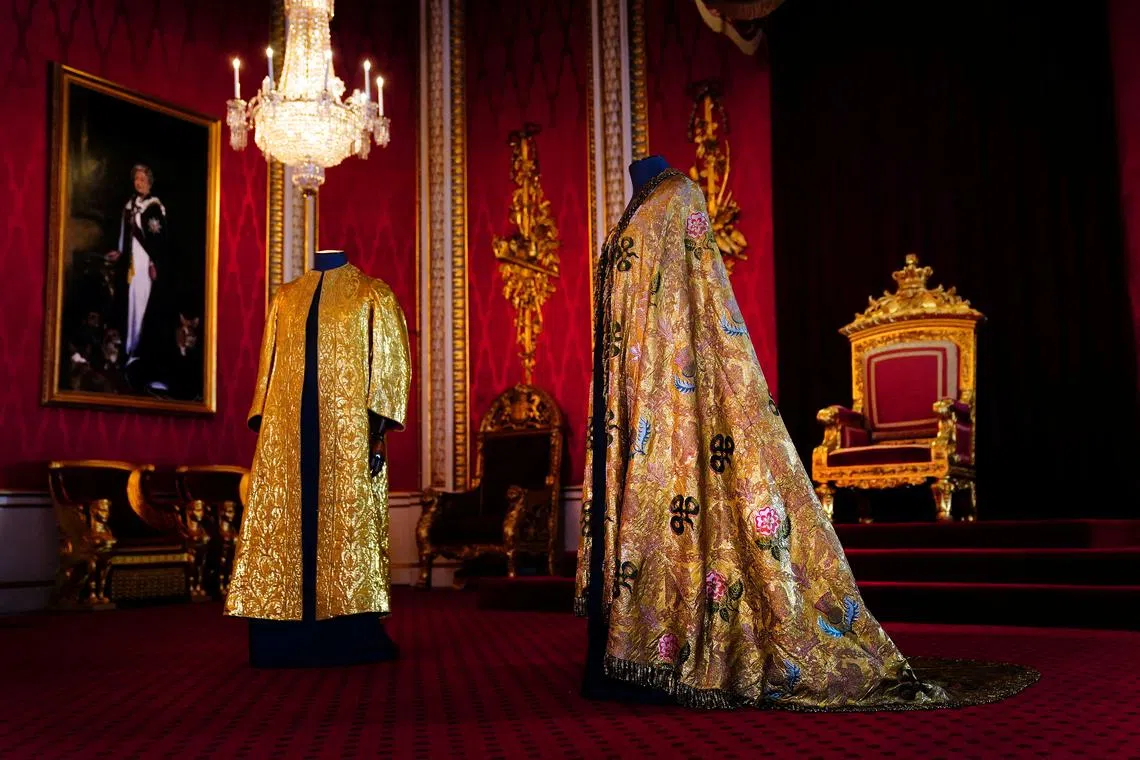 A view of the Coronation Vestments, comprising of the Supertunica and the Imperial Mantle, which will be worn by Britain's King Charles during his coronation at Westminster Abbey, displayed in the Throne Room at Buckingham Palace, London, Britain, April 26, 2023. 
