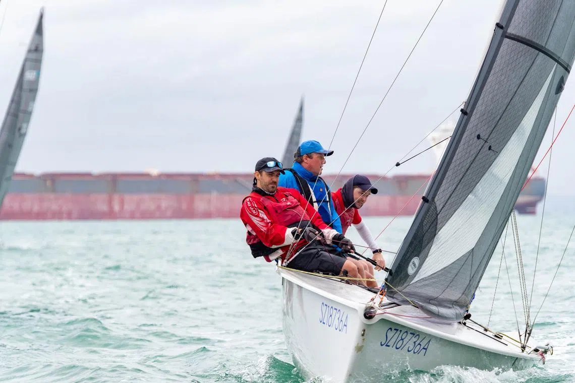 (From left) Magnus Ekbom, Freddie Hall and Agoston Sipos from Raffles Marina in action at the SB20 Asian Grand Slam and Asia Pacific Championships. 