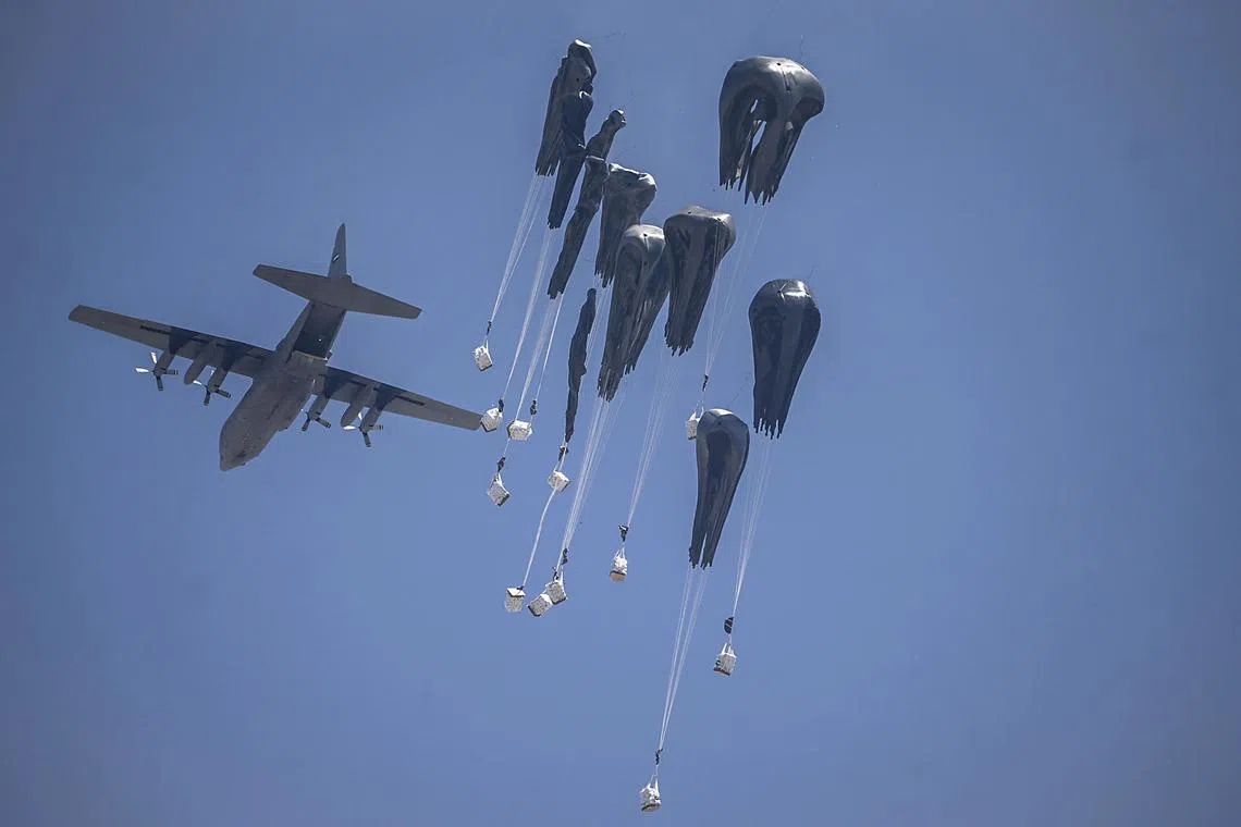 Humanitarian aid being airdropped by the Royal Jordanian Army over the northern Gaza Strip on July 27.