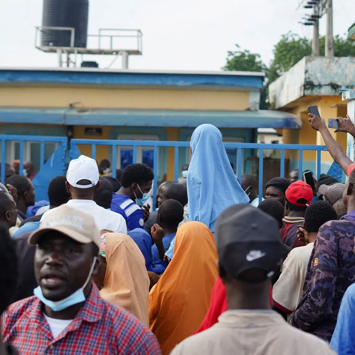 Family members of illegal mining suspects arrested in mining raids who reportedly died while in detention gather at Minna General Hospital in Minna, Niger State, Nigeria, September 17, 2026. REUTERS/Ibrahim Ndamitso