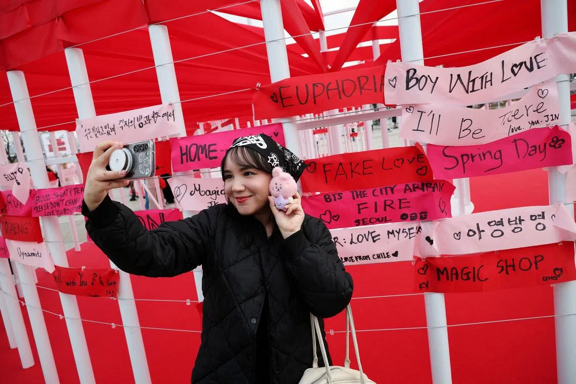 A Mexican fan of Kpop group BTS taking a selfie during an event 'Love Song Lounge' to promote their new album Arirang before 'BTS The Comeback Live Arirang' concert in central Seoul, South Korea, on March 20, 2026. 