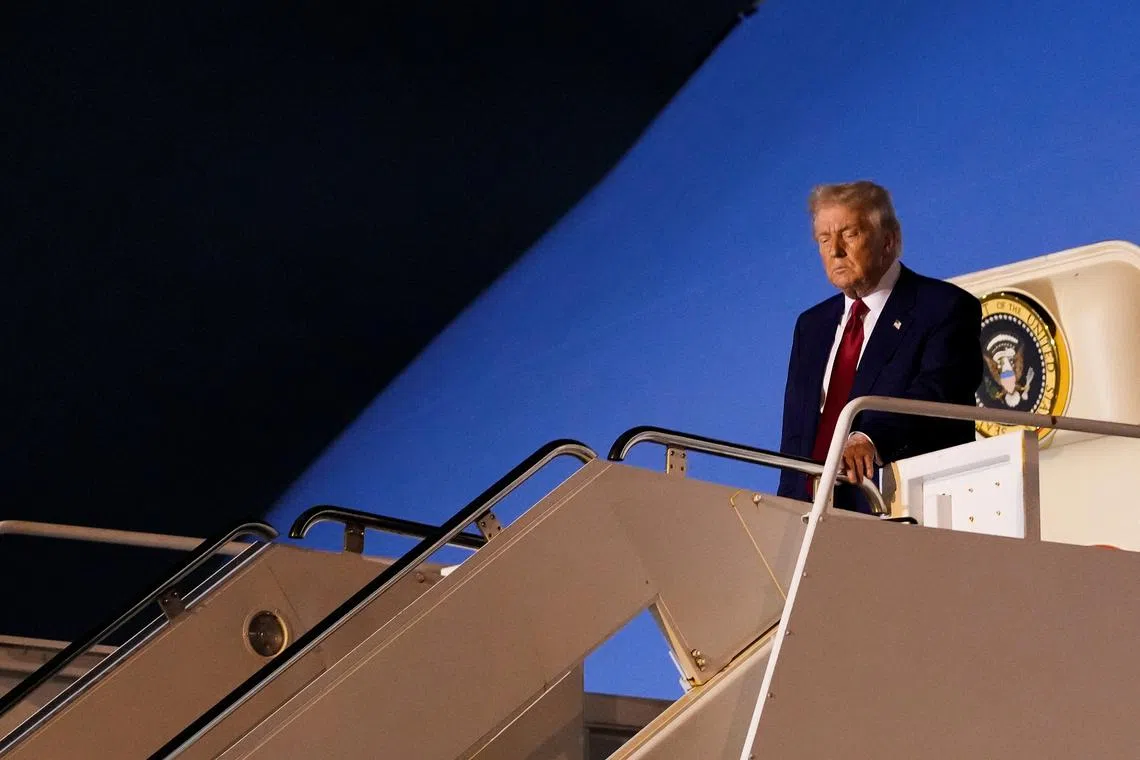 U.S. President Donald Trump disembarks Air Force One as he arrives at Palm Beach International Airport in West Palm Beach, Florida, U.S., April 3, 2025. REUTERS/Kent Nishimura/File Photo