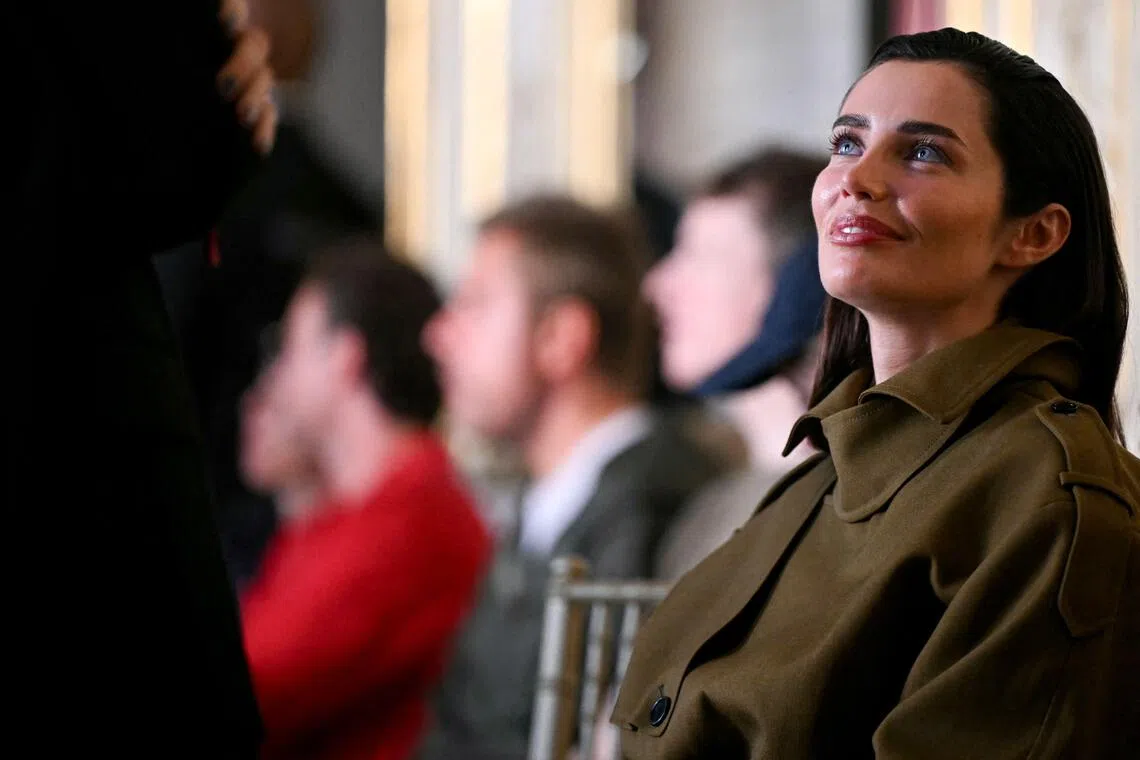 British model Rebecca Donaldson reacts ahead of the Balmain Women's Spring/Summer 2027 collection fashion show as part of the Paris Fashion Week, in Paris on September 30, 2026. (Photo by LOU BENOIST / AFP)