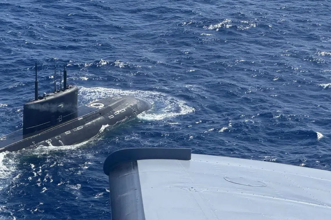 The Russian Navy's Ufa attack submarine was spotted after it surfaced 148km west of the Philippines' coasts.