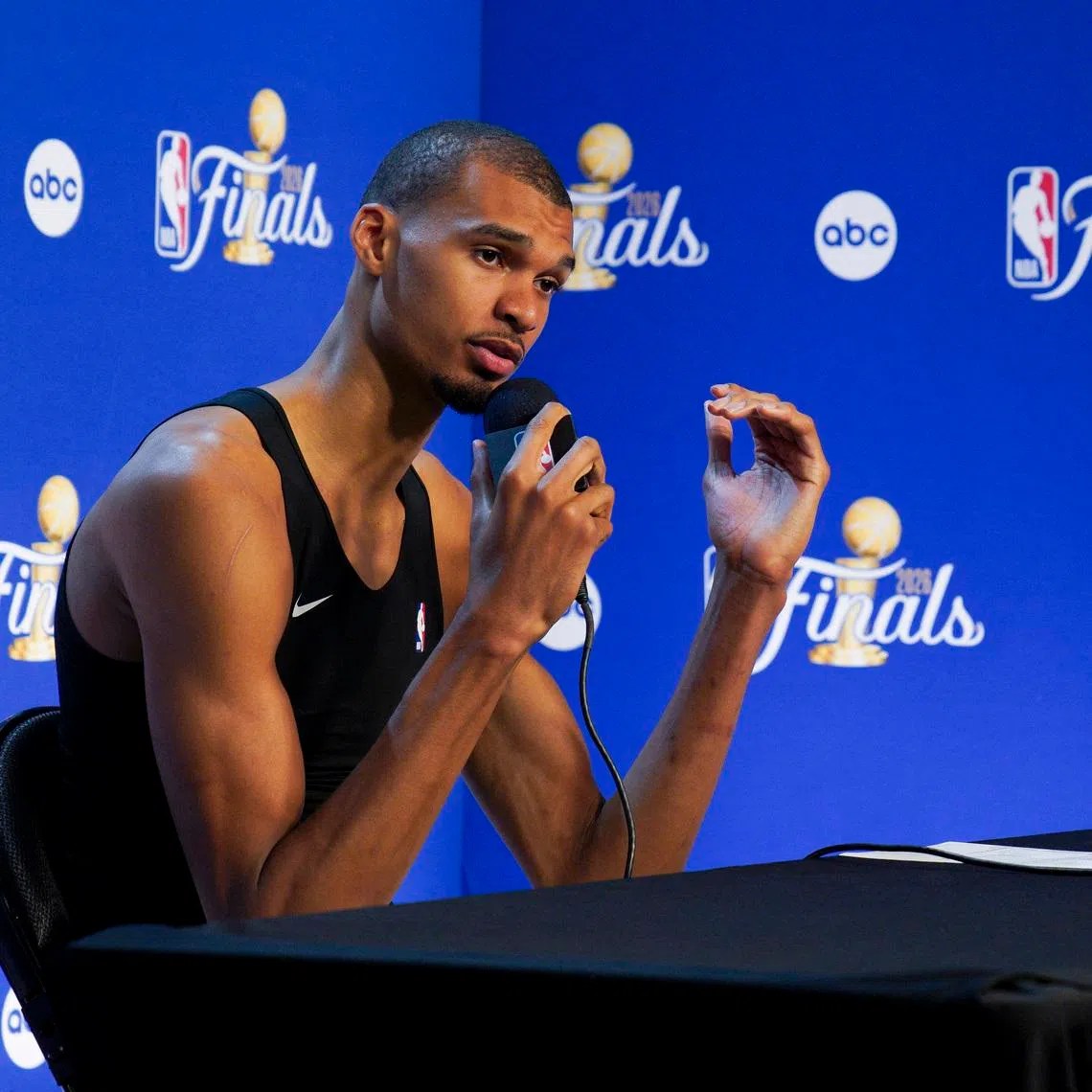 Jun 13, 2026; San Antonio, Texas, USA; San Antonio Spurs forward Victor Wembanyama (1) speaks to the media after the New York Knicks defeat the Spurs during game five of the 2026 NBA Finals at Frost Bank Center. Mandatory Credit: Dustin Safranek-Imagn Images