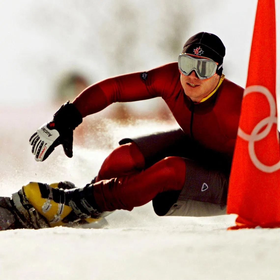 FILE PHOTO: Ryan Wedding of Canada takes a practice run for the men's parallel giant slalom of the Salt Lake 2002 Winter Olympic Games in Park City, February 13, 2002. Competition in the men's parallel giant slalom begins February 14, 2002. REUTERS/Jeff J Mitchell/File Photo