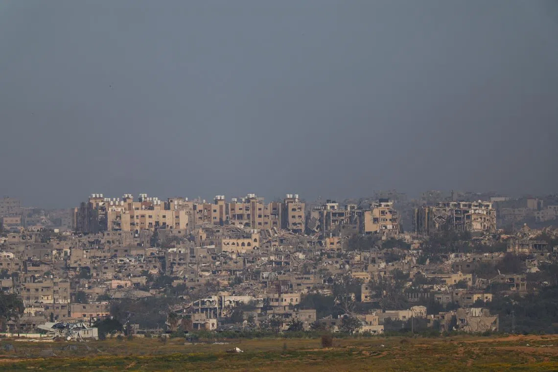 FILE PHOTO: A view of destroyed buildings in Gaza, amid the ongoing conflict between Israel and the Palestinian Islamist group Hamas, as seen from southern Israel, April 2, 2024. REUTERS/Hannah McKay/File Photo
