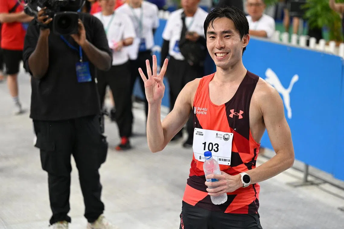 Soh Rui Yong crosses the finish line to clinch his fourth national title at the 22nd edition of the Standard Chartered Singapore Marathon  on Dec 3, 2023.