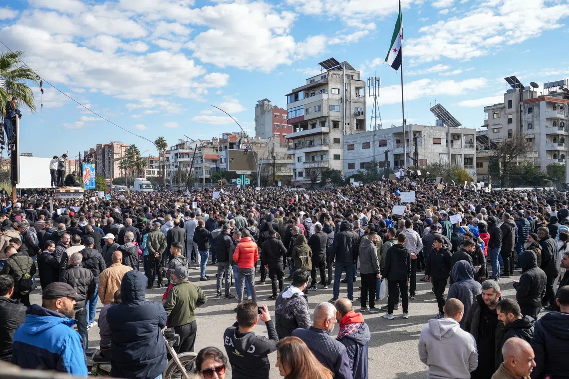 Thousands of Syrian Alawites gathered in coastal and central parts of the country on Dec 28 to protest after Dec 26’s bombing at a mosque.