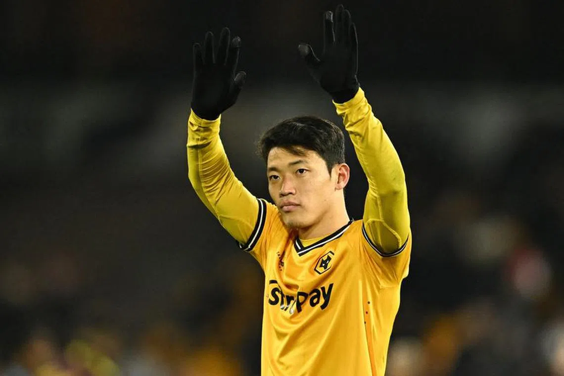 Soccer Football - Premier League - Wolverhampton Wanderers v Burnley - Molineux Stadium, Wolverhampton, Britain - December 5, 2023 Wolverhampton Wanderers' Hwang Hee-chan applauds fans after the match REUTERS/Dylan Martinez
