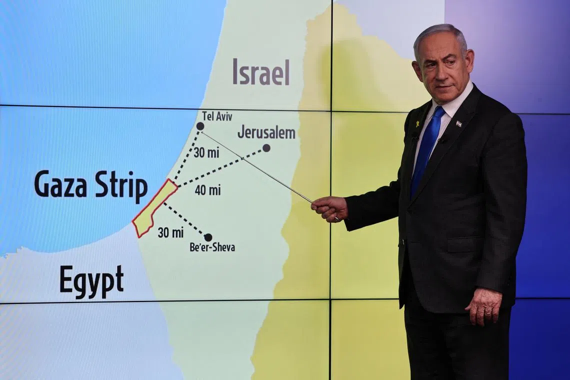 Israeli Prime Minister Benjamin Netanyahu stands before a map showing the Gaza Strip, during a press conference for the international media at the Government Press office in Jerusalem, amid the Israel-Hamas conflict, 04 September 2024. ABIR SULTAN/Pool via REUTERS