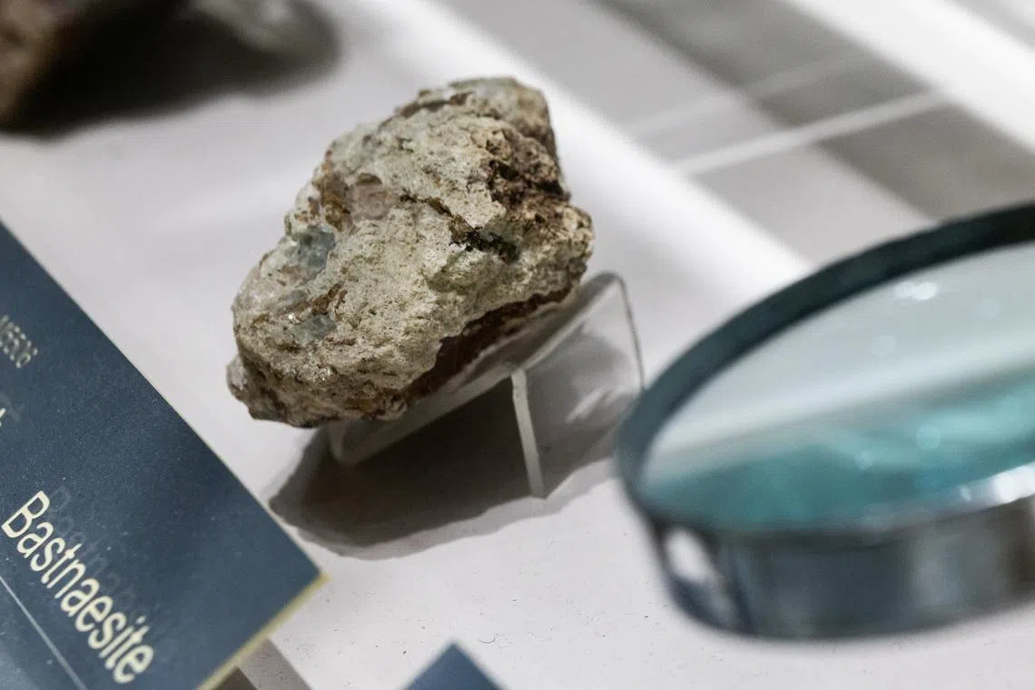 A sample of bastnaesite ore, a mineral used in the rare earth industry to extract elements such as cerium, lanthanum, and neodymium, is displayed at the Geological Museum of China in Beijing, China, October 14, 2025. REUTERS/Maxim Shemetov