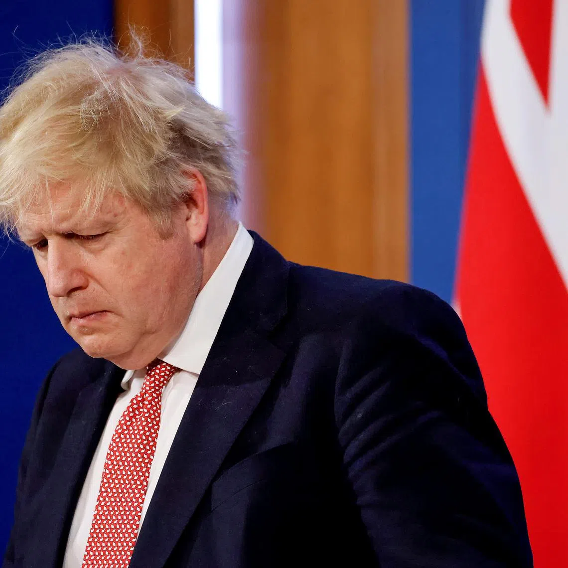 FILE PHOTO: British Prime Minister Boris Johnson attends a news conference to outline the government's new long-term coronavirus disease (COVID-19) pandemic plan, at Downing Street in London, Britain, February 21, 2022. Tolga Akmen/Pool via REUTERS