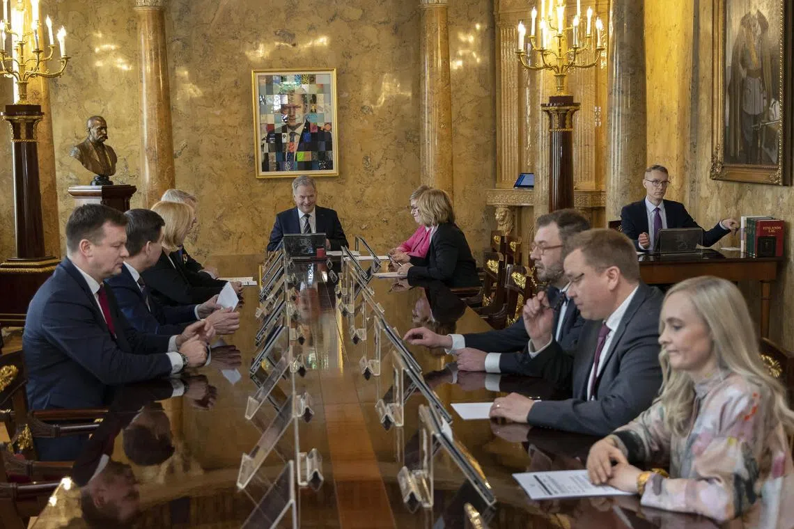 Finland's President Sauli Niinisto (centre) attends a meeting with ministers before signing the Nato Law in Helsinki, Finland, on March 23, 2023. 