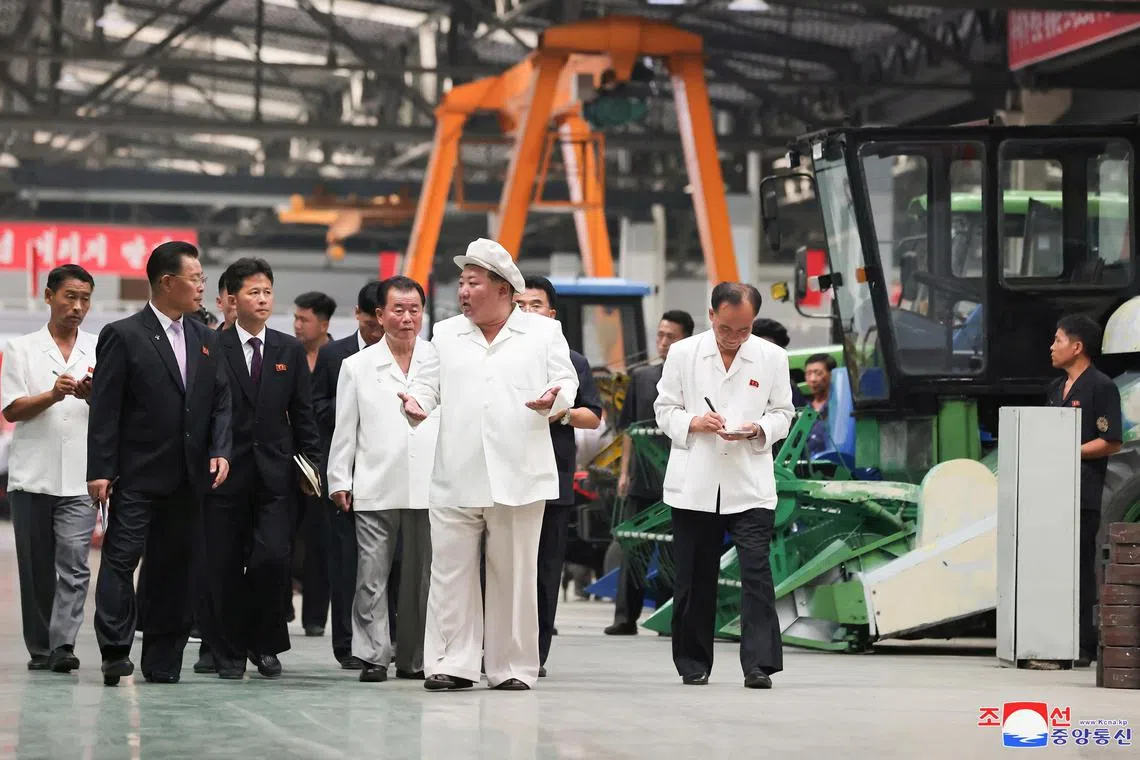 North Korean leader Kim Jong Un inspects the Kumsong Tractor Factory in North Korea August 23, 2023 in this photo released by North Korea's Korean Central News Agency (KCNA).   KCNA via REUTERS    ATTENTION EDITORS - THIS IMAGE WAS PROVIDED BY A THIRD PARTY. REUTERS IS UNABLE TO INDEPENDENTLY VERIFY THIS IMAGE. NO THIRD PARTY SALES. SOUTH KOREA OUT. NO COMMERCIAL OR EDITORIAL SALES IN SOUTH KOREA.