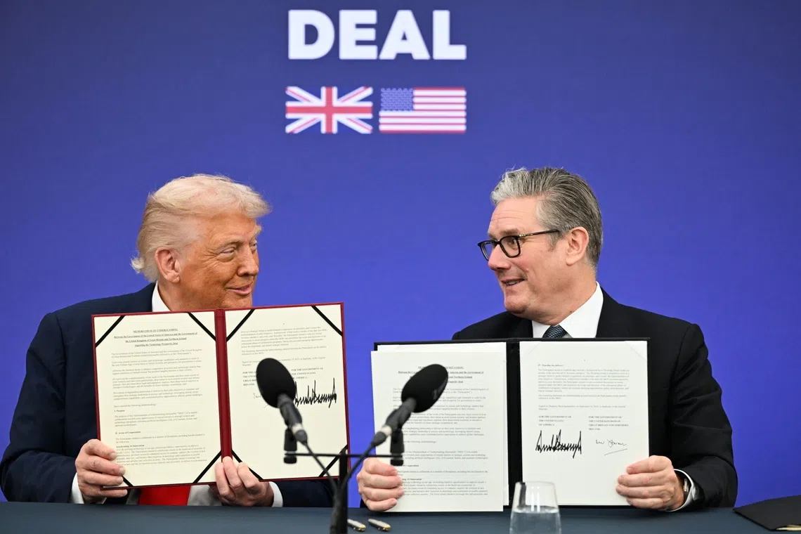 US President Donald Trump (left) and British Prime Minister Keir Starmer signing a “Tech Prosperity Deal” in Aylesbury, Britain, on Sept 18.