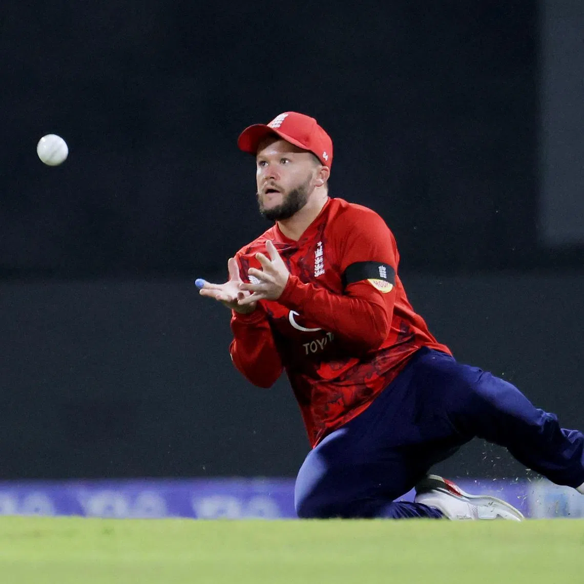 Cricket - Third Twenty20 International - Sri Lanka v England - Pallekele International Cricket Stadium, Kandy, Sri Lanka - February 3, 2026 England's Ben Duckett takes a catch to dismiss Sri Lanka's Kamil Mishara off the bowling of England's Luke Wood REUTERS/Lahiru Harshana