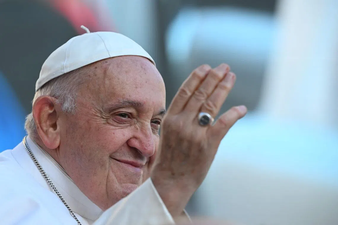 The new cardinals will kneel before the pope to receive the two symbols of their high office: a scarlet four-cornered cap known as a biretta, and a cardinal’s ring.