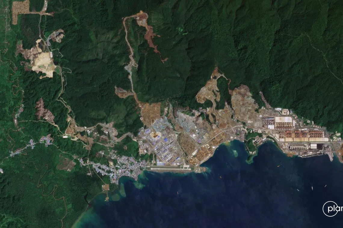 This handout satellite image taken on December 14, 2022 and received on May 30, 2024 from Planet Labs PBC shows an overhead view of the effects of mining activity on a territory inhabited by the O'Hongana Manyawa indigenous group in Central Halmahera Regency on Indonesia's Halmahera Island. Deforestation at one of Indonesia's largest nickel processing hubs is threatening an Indigenous group that is among the country's last uncontacted tribes, rights groups allege. (Photo by Handout / Planet Labs PBC / AFP) / RESTRICTED TO EDITORIAL USE - MANDATORY CREDIT "AFP PHOTO / PLANET LABS PBC" - NO MARKETING NO ADVERTISING CAMPAIGNS - DISTRIBUTED AS A SERVICE TO CLIENTS
To go with 'INDONESIA-ENVIRONMENT-MINING-CLIMATE-RIGHTS, FOCUS' by Agnes ANYA