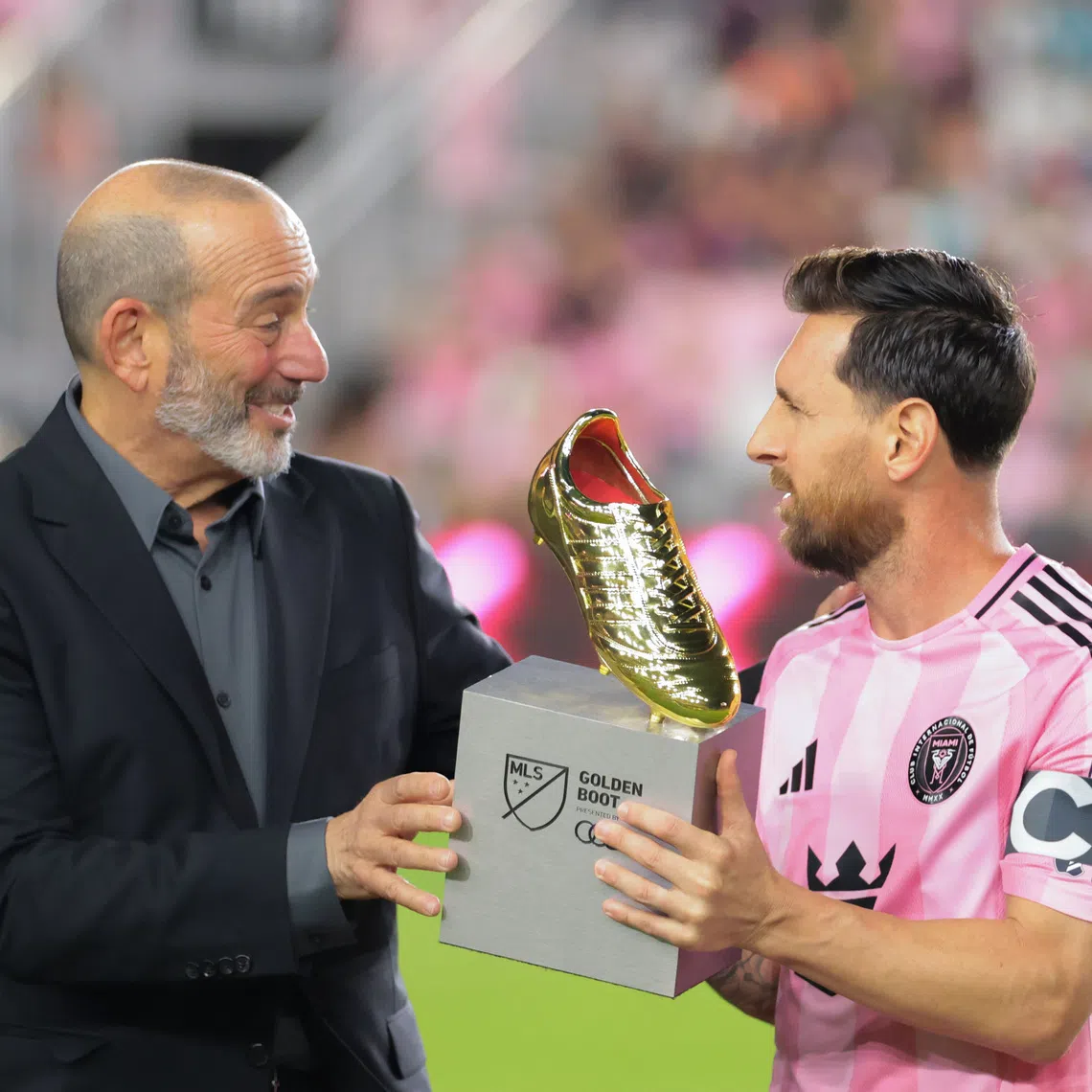 Oct 24, 2025; Fort Lauderdale, Florida, USA; MLS Commissioner Don Garber presents the MLS Golden Boot award for the most goals scored during the regular season to Inter Miami CF forward Lionel Messi (10) before the game against Nashville SC at Chase Stadium. Mandatory Credit: Sam Navarro-Imagn Images