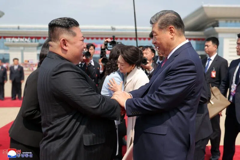 North Korean leader Kim Jong Un (L) seeing off China's President Xi Jinping after  the latter's rare visit to North Korea on June 8, where he proclaimed a willingness to bring ties to "new heights" . 