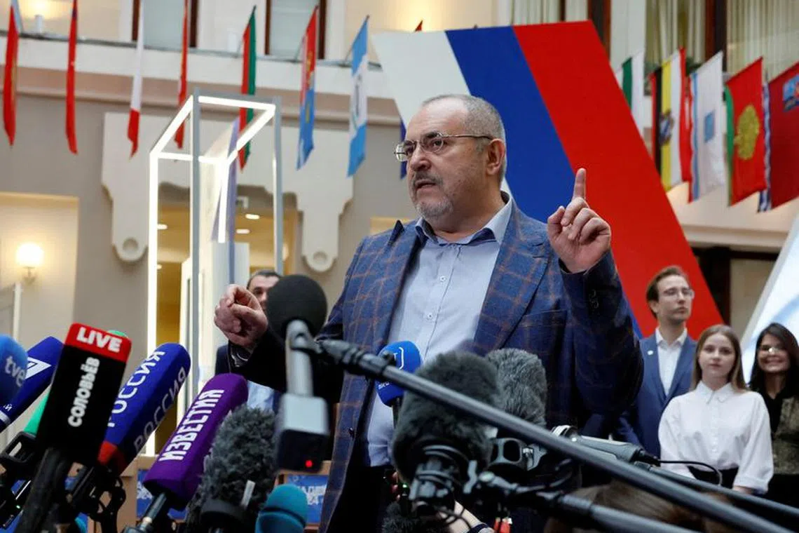 FILE PHOTO: Boris Nadezhdin, a representative of Civil Initiative political party who plans to run for Russian president in the March 2024 election, talks to journalists as he visits an office of the Central Election Commission to submit documents and signatures in support of his candidacy, in Moscow, Russia January 31, 2024. REUTERS/Shamil Zhumatov/File Photo
