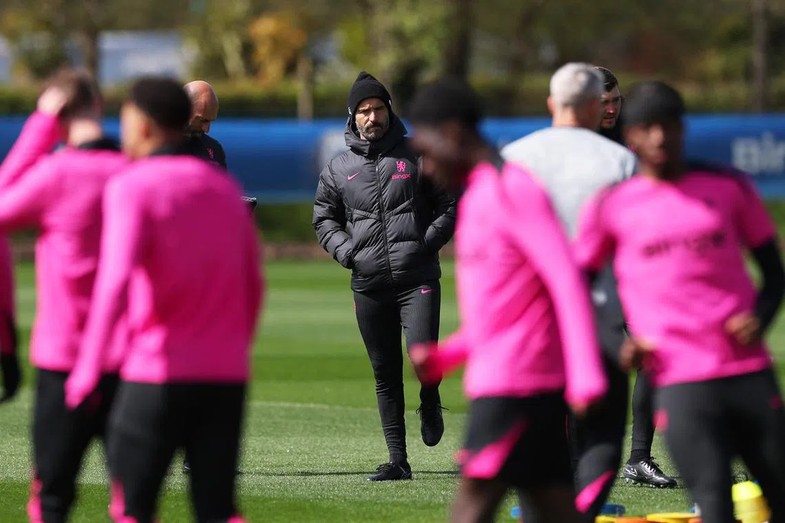 FILE PHOTO: Soccer Football - Conference League - Chelsea Training - Cobham Training Centre, Cobham, Britain - April 16, 2025 Chelsea manager Enzo Maresca during training Action Images via Reuters/Paul Childs/File Photo