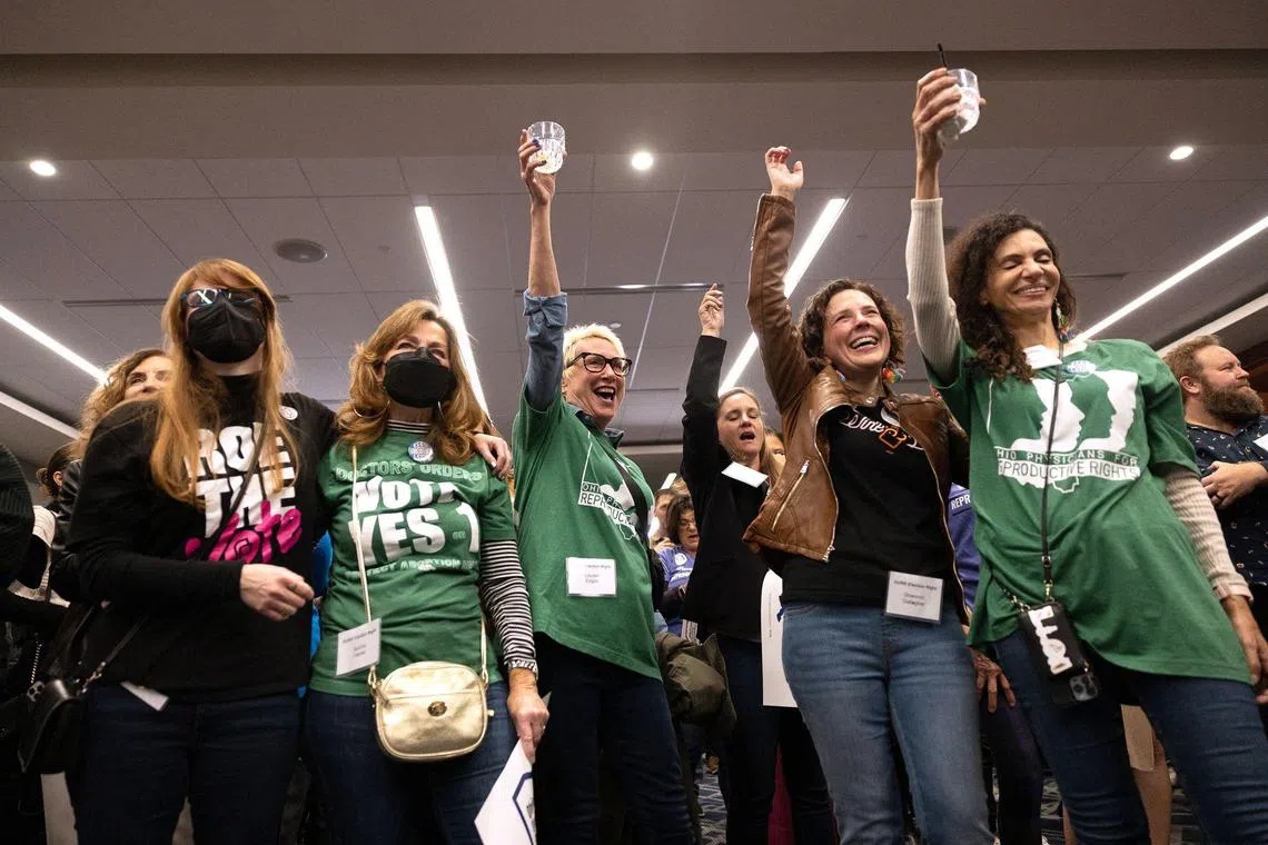Abortion rights supporters celebrate winning the referendum to enshrine a right to abortion in Ohio's Constitution.