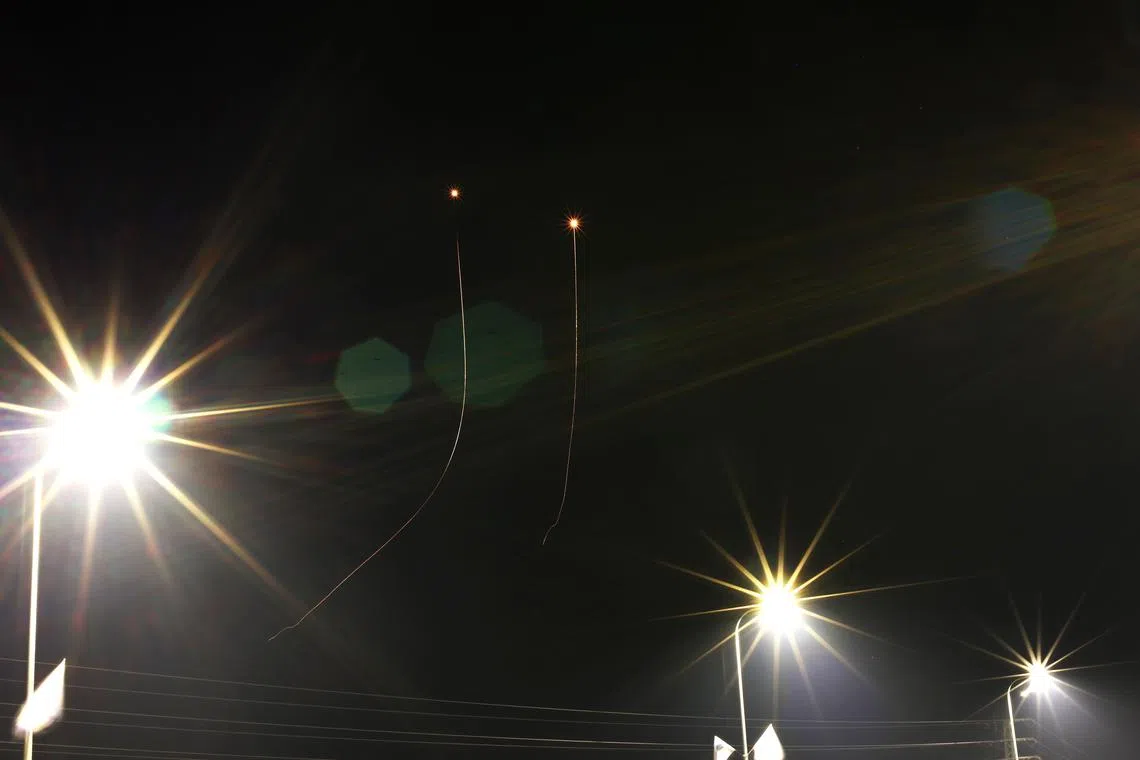 The Israeli Iron Dome intercepts missiles launched from southern Lebanon, near Kiryat Shemona, in northern Israel, 14 April 2024.