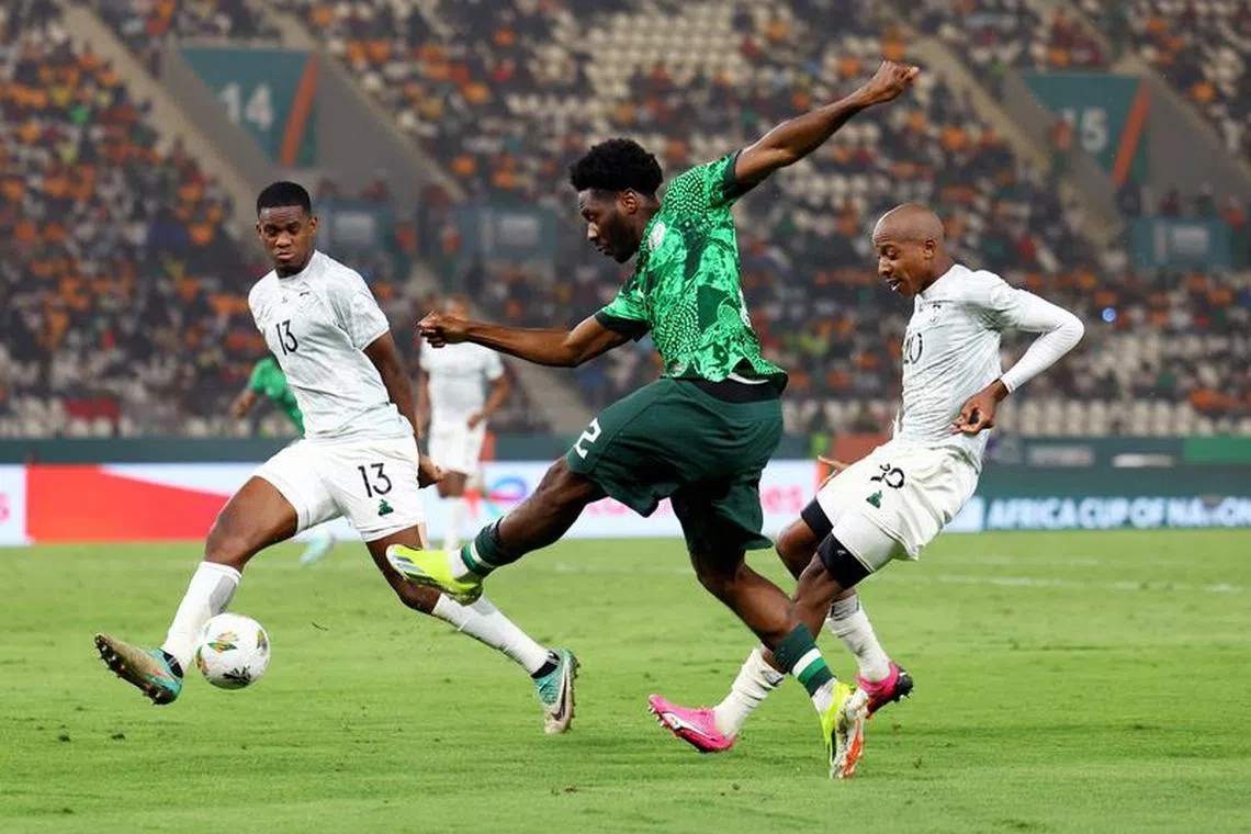 Soccer Football - Africa Cup of Nations - Semi Final - Nigeria v South Africa - Stade de la Paix, Bouake, Ivory Coast - February 7, 2024  Nigeria's Ola Aina shoots at goal REUTERS/Siphiwe Sibeko