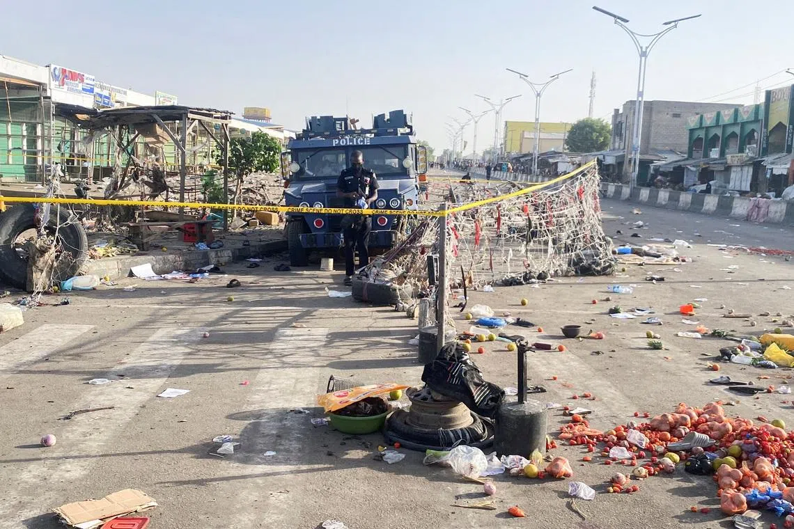 A Nigerian police truck stands at the deserted Maiduguri Monday Market the morning after multiple explosions struck the northeastern city of Maiduguri, Borno State, Nigeria, March 17, 2026. REUTERS/Ahmed Kingimi