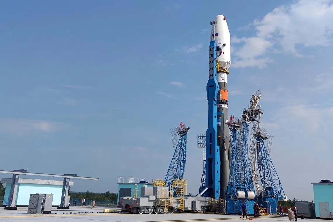 In this handout photograph taken and released by the Russian Space Agency Roscosmos on August 8, 2023, a Soyuz 2.1b rocket with the Luna-25 lander is seen mounted on the launch pad ahead of its launch scheduled for August 11, 2023, at the Vostochny cosmodrome, some 180 km north of Blagoveschensk, in the Amur region. Russia said on August 7, 2023 it plans to launch a lunar lander later this week after multiple delays, hoping to return to the Moon for the first time in nearly fifty years. (Photo by Handout / Russian Space Agency Roscosmos / AFP) / RESTRICTED TO EDITORIAL USE - MANDATORY CREDIT "AFP PHOTO / Russian Space Agency Roscosmos / handout" - NO MARKETING NO ADVERTISING CAMPAIGNS - DISTRIBUTED AS A SERVICE TO CLIENTS