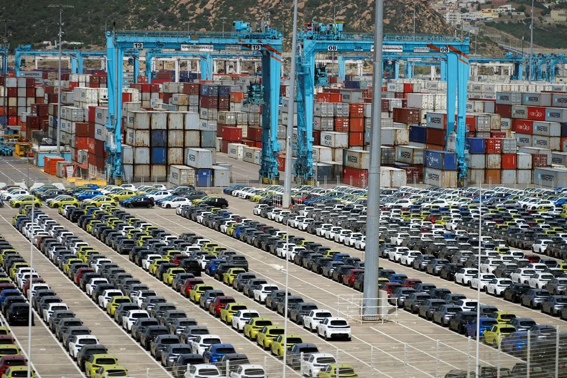 FILE PHOTO: Cars, made in Morocco and intended for export, wait to be shipped at Tanger Med Port, on the Strait of Gibraltar, east of Tangier, Morocco June 6, 2024. REUTERS/Abdelhak Balhaki/File Photo