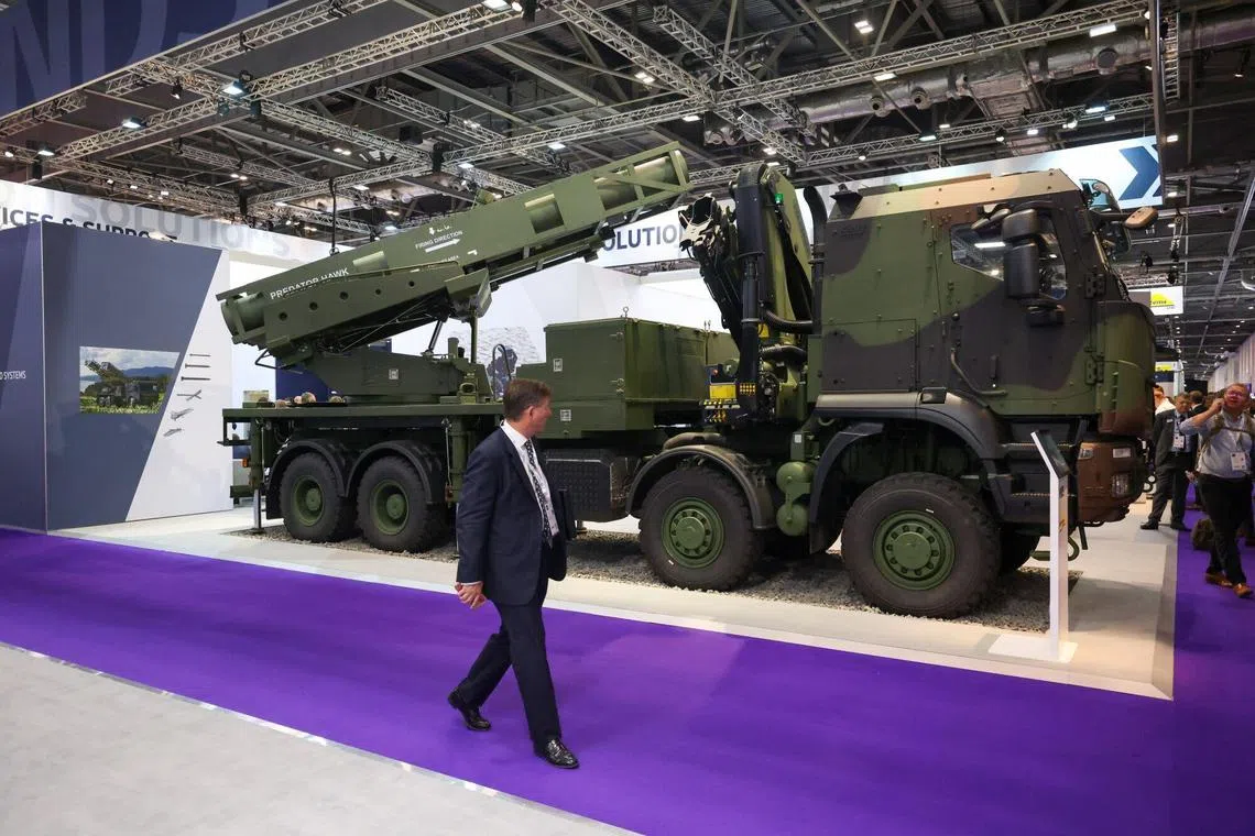 A mobile rocket artillery system is seen on the opening day of the Defence and Security Equipment International in London.