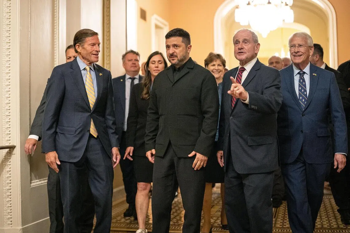 Ukrainian President Volodymyr Zelensky (centre) visiting senators in Washington on July 28.
