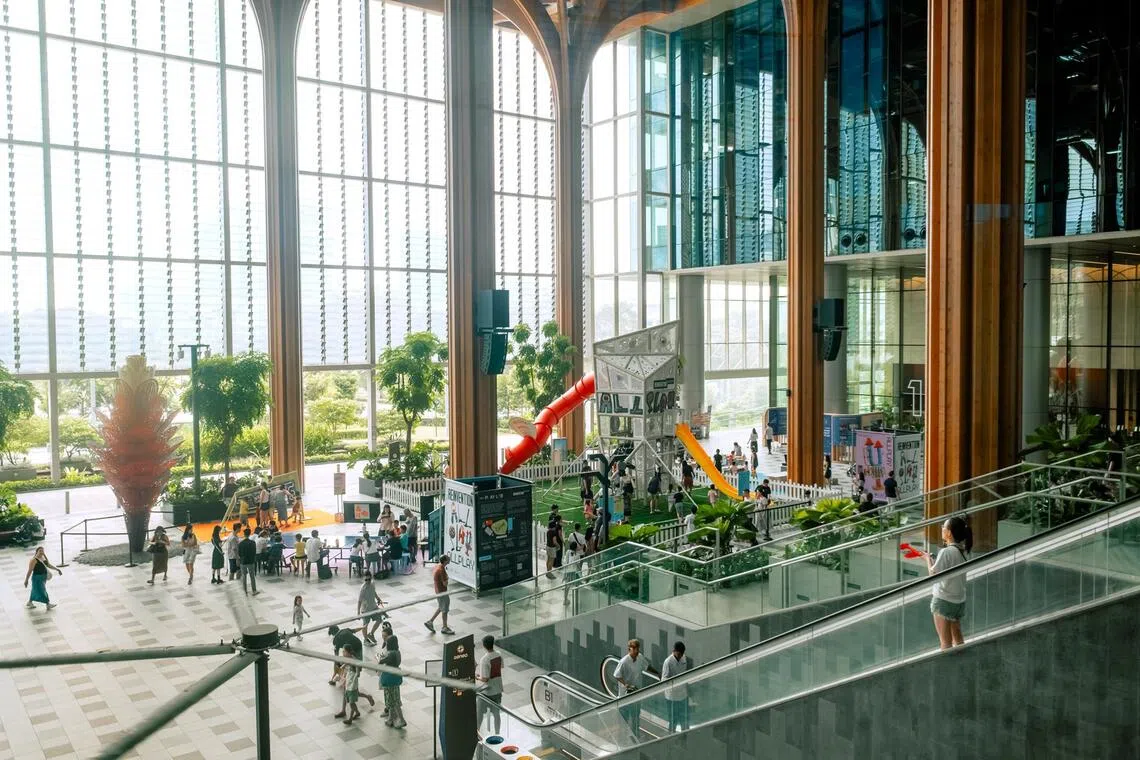 The cathedral-like Canopy at the Geneo cluster of Singapore Science Park is an all-weather event plaza for “placemaking”.