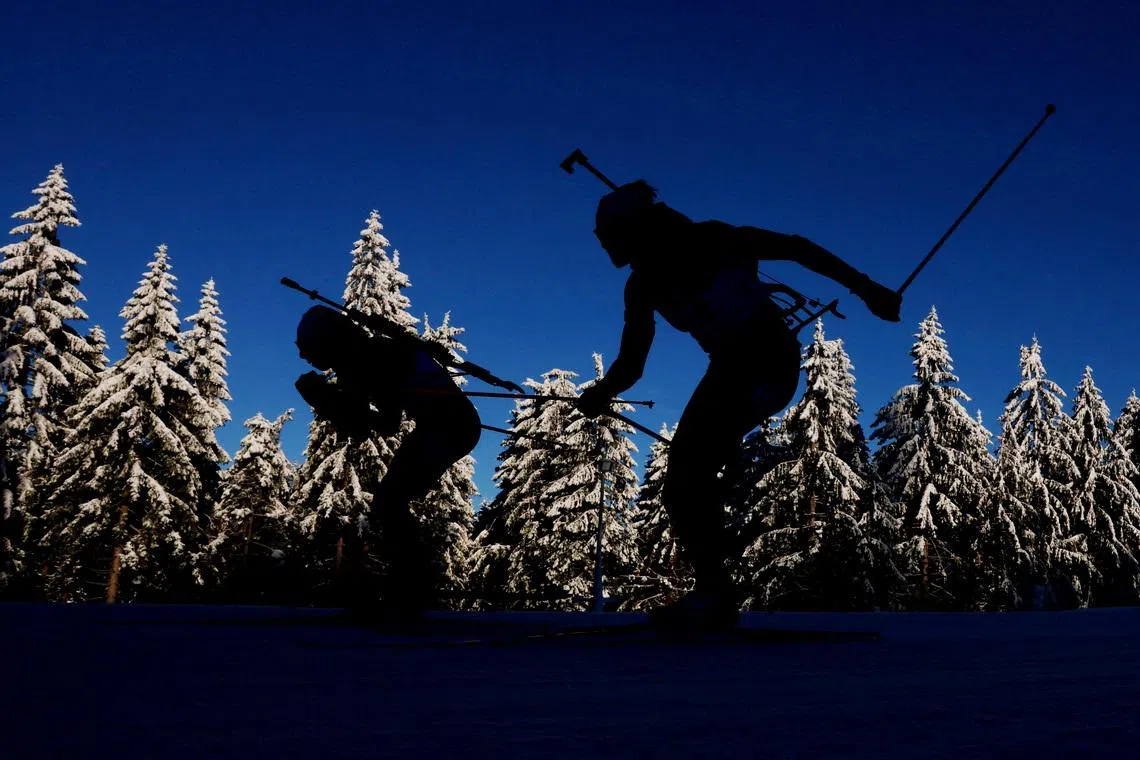Canada's Nadia Moser and Belgium's Maya Cloetens in action during the women's 10km pursuit Biathlon, at the Biathlon World Cup in Oberhof, Germany, on Jan 11, 2026.