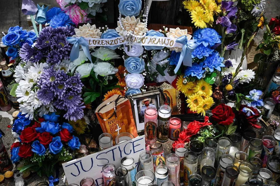 More than 1,000 people marched peacefully through the neighbourhood on July 8 and residents have laid flowers and candles at the scene.