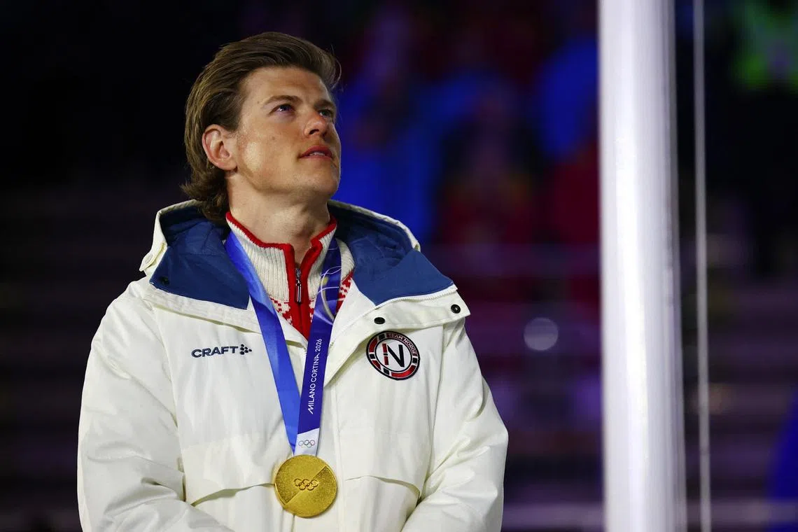 FILE PHOTO: Milano Cortina 2026 Olympics - Cross-Country Skiing - Men's 50km Mass Start Classic Victory Ceremony - Verona Olympic Arena, Verona, Italy - February 22, 2026. Gold medallist Johannes Hoesflot Klaebo of Norway celebrates on the podium after winning the Men's 50km Mass Start Classic REUTERS/Guglielmo Mangiapane/File Photo