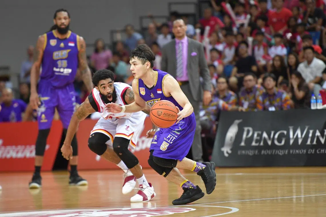 CLS Knights Indonesia's Wong Wei Long went past Singapore Slingers' Jerran Young on 15 May 2019. CLS Knights Indonesia are champion after beating Singapore Slingers 84-81 in the Asean Basketball League Finals decider on 15 May 2019 at OCBC Arena Hall 1 on 15 May 2019.