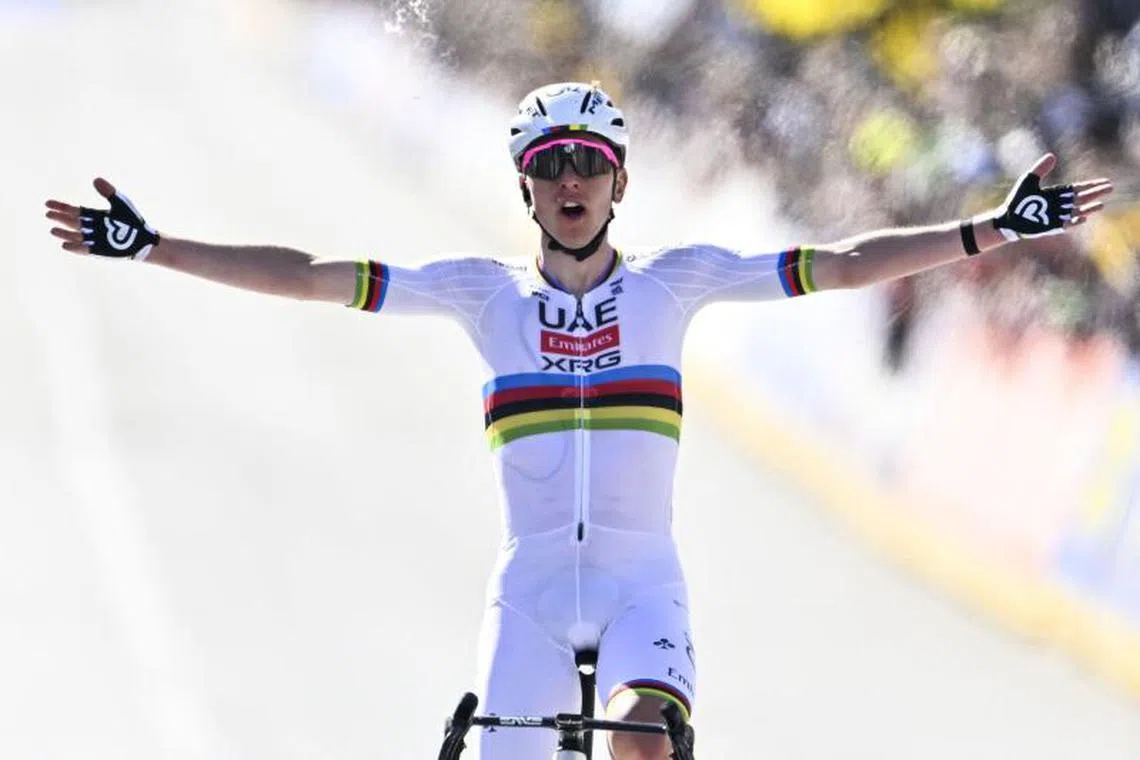 Slovenian Tadej Pogacar of UAE Team Emirates celebrates after winning the men's race of the Tour of Flanders one day cycling race, 268,9km from Brugge to Oudenaarde, on April 6, 2025. (Photo by ERIC LALMAND / Belga / AFP) / Belgium OUT