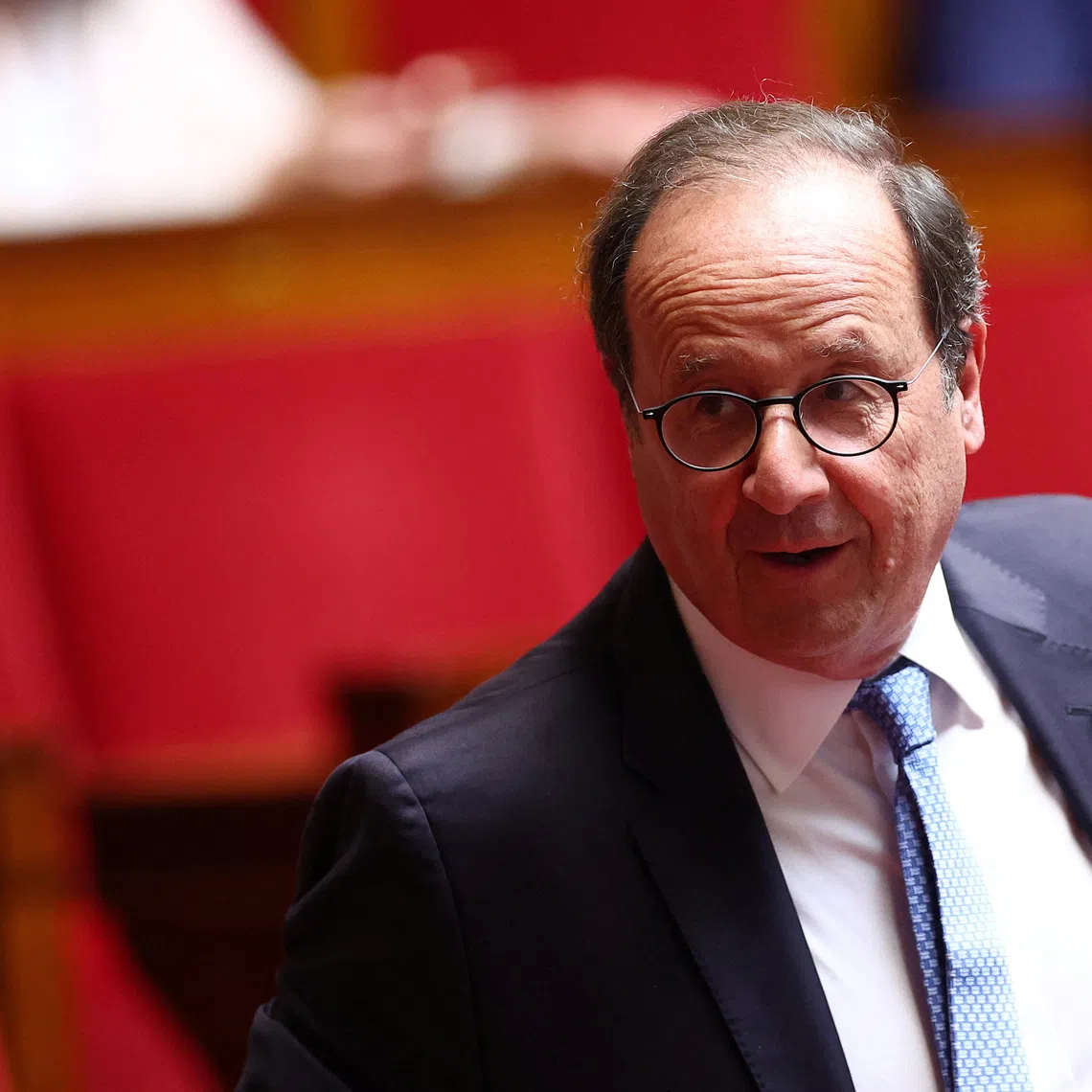 Former French President Francois Hollande, member of Parliament of the Socialistes et apparentes (members of Socialist Party - SOC) parliamentary group, attends the questions to the government session at the National Assembly in Paris, France, April 28, 2026. REUTERS/Abdul Saboor