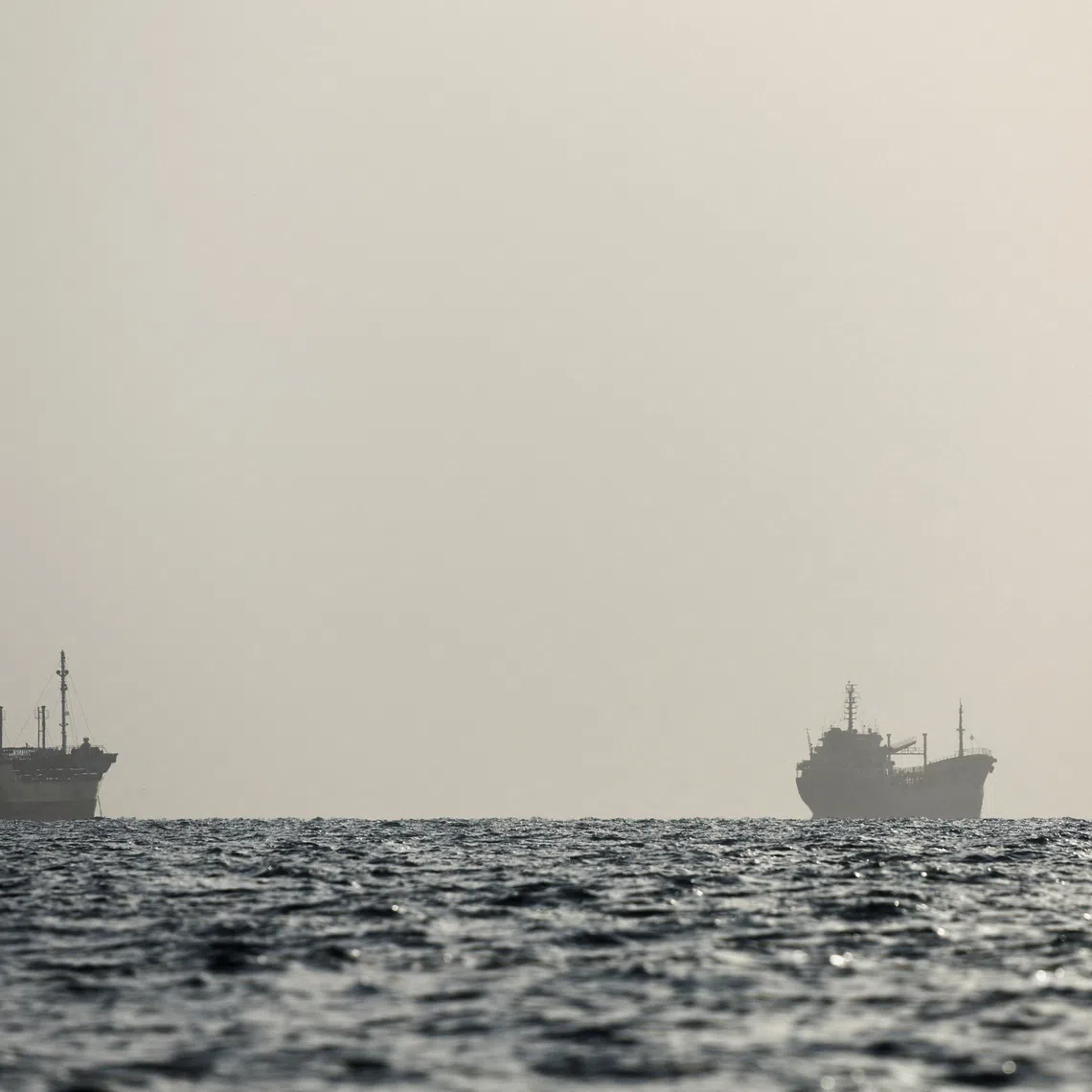 Vessels in the Strait of Hormuz are visible near the beach of Bandar Abbas, Iran, on Aug 27.